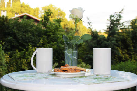 White marble table with two ceramic cups in expectationの写真素材