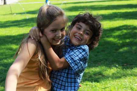 Two happy children in the parkの写真素材