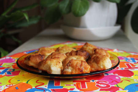 Homemade scones with cheese on colorful napkinの写真素材