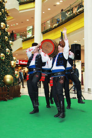 Festive Christmas performance of bulgarian folklore formation in Mall Serdika -  24. 12. 2012, Sofia, Bulgariaのeditorial素材