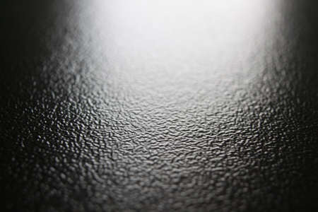 Light on metal surface as texture or backgroundの写真素材