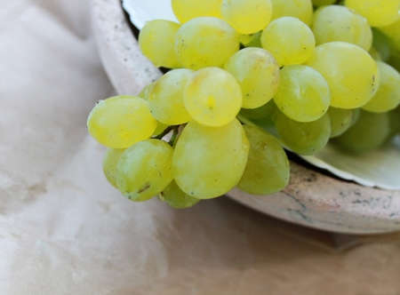 Closeup picture of delicious yellow - green grapeの写真素材