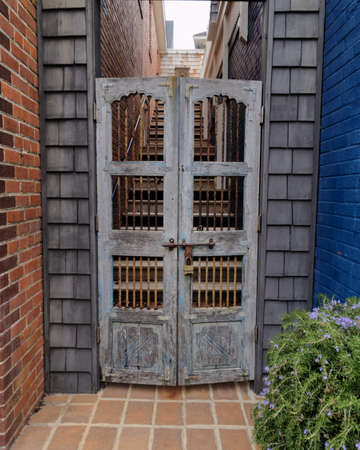 Old Wooden Door with Brick Wallの写真素材