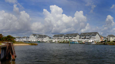 View of beach homes on waterfront marina in the Outer Banks of North Carolina.の写真素材