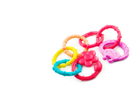 A colorful baby's teething ring isolated on a white background with copy spaceの写真素材