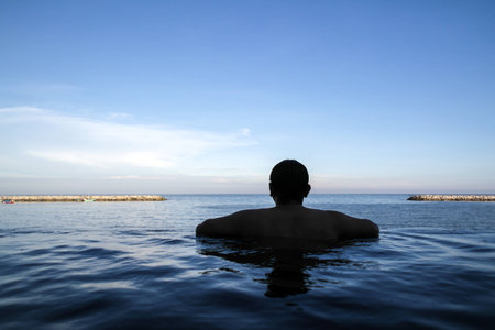 Edge of infinity swimming pool overlooking ocean