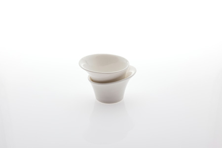 Double white empty sauce cup isolated on the white background table topの写真素材