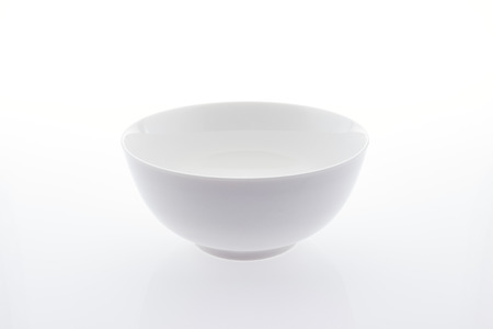 white empty rice bowl isolated on the white background table topの写真素材