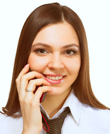 attractive young woman calling by mobile phone. Isolated over whiteの写真素材