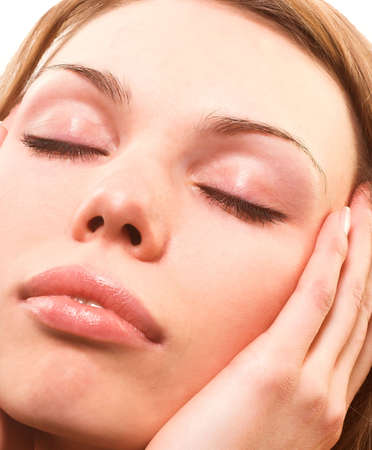 Beautiful  woman with close eyes relaxingの写真素材