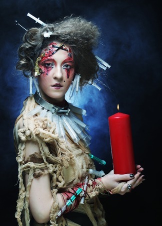 Young woman with creative make up. Halloween theme. Zombie theme.の写真素材