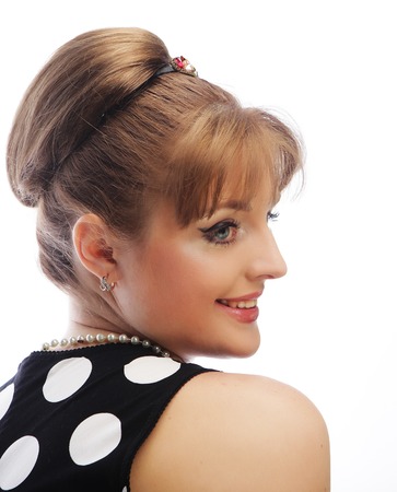 Pinup woman, style retro haircut, studio shotの写真素材