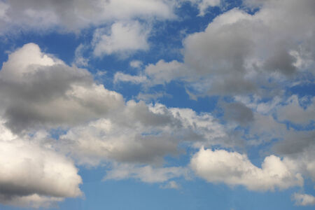 blue sky background with white cloudsの写真素材