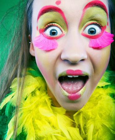 funny girl with crazy make-upの写真素材
