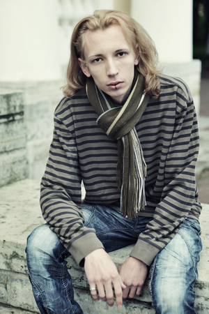 Young fashion male model posing outdoorの写真素材