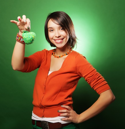 Attractive playful young woman ready for partyの写真素材