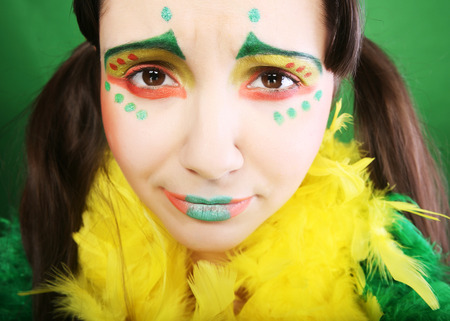 funny girl with crazy make-upの写真素材