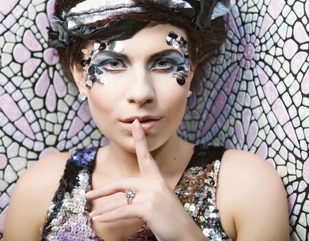 young woman with creative make upの写真素材