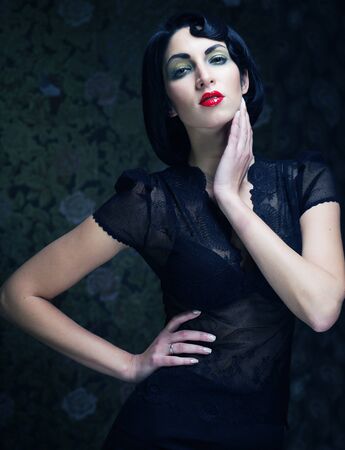 Fashion art girl portrait.Vamp style. Glamour vampire woman.Studio shot.の写真素材