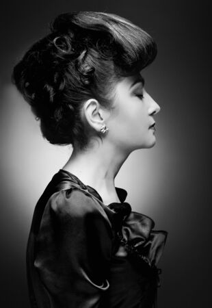 Portrait of a beautiful woman with stylish hairstyle and makeupの写真素材