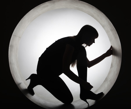 stylish silhouette beautiful woman in circleの写真素材
