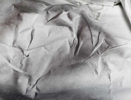 black and white paper background, creased paper textureの写真素材
