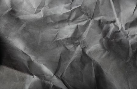 black and white paper background, creased paper textureの写真素材