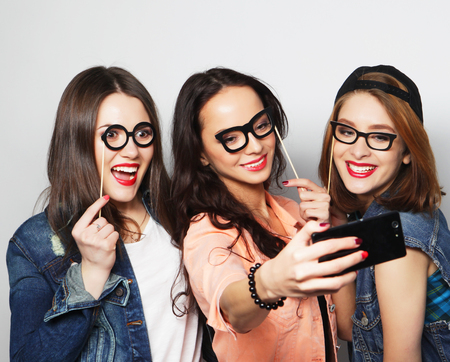 funny girls, ready for party, selfieの写真素材