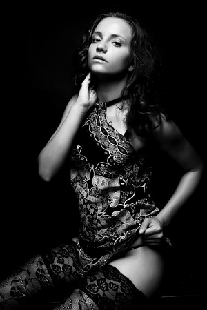 Beautiful alluring young woman in sexy lingerieの写真素材