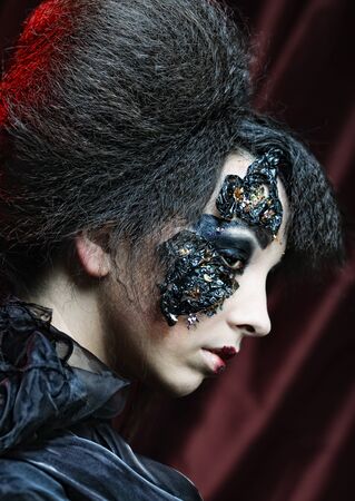 Young woman with creative make up. Halloween theme.の写真素材