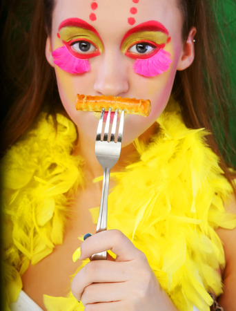 funny girl with crazy make-upの写真素材