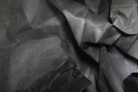 black and white paper background, creased paper textureの写真素材
