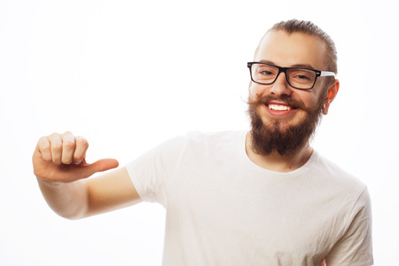 life style, education and people concept: happy man giving thumbs up sign - portrait on white background.の写真素材
