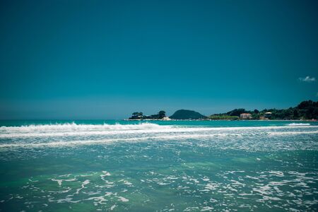 Travel concept - beach summer with clouds and blue sky