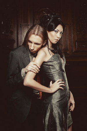 Beautiful couple in love in historical palace. Luxury.の写真素材