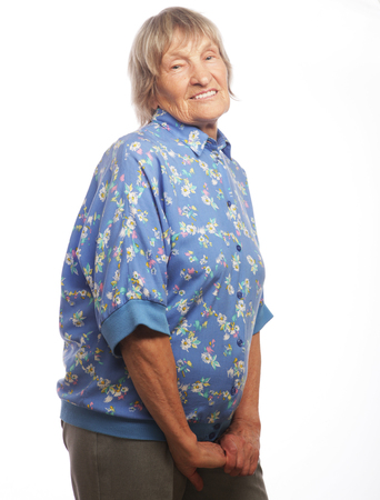 Happy senior woman isolated on whiteの写真素材