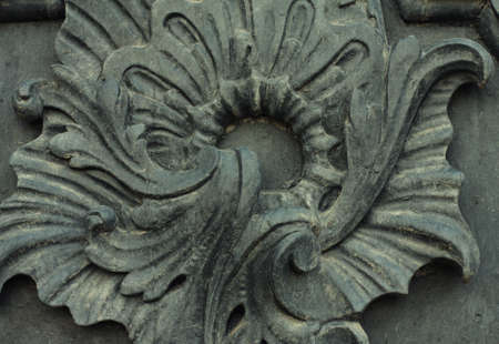 Weathered and rusty decoration element of vintage metal doorsの写真素材