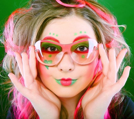 funny girl with crazy make-upの写真素材