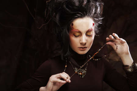 Bright creative Make-up.Beautiful Woman's Faceの写真素材