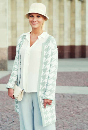 young fashion  blond woman walking on the streetの写真素材