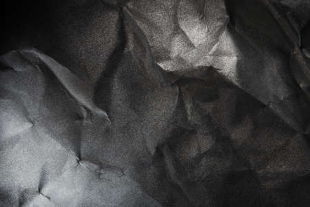 black and white paper background, creased paper textureの写真素材