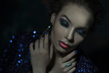 Young fashion woman with bright make upの写真素材