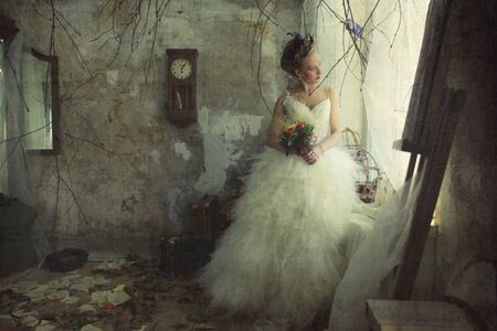 Romantic young bride in vintage interior in autumn style.