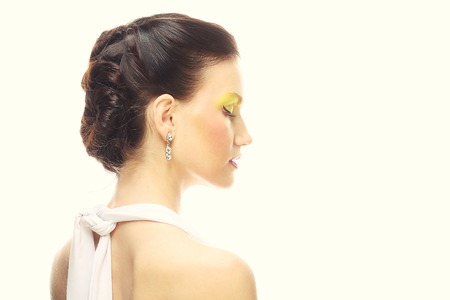 Portrait of beauty young girl with bright multicolored make-up.の写真素材