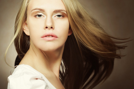 Photo of beautiful woman with magnificent hairの写真素材