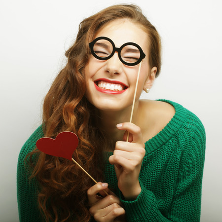 Attractive playful young woman ready for partyの写真素材