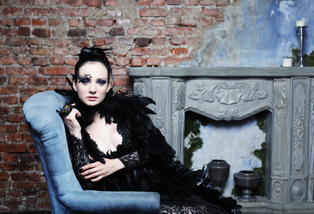 Fashion model in black dress. Luxury.の写真素材