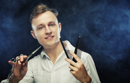 portrait of young t hairstylist looking at cameraの写真素材
