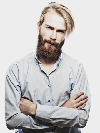 life style and people concept: young bearded man, casual style, close up. Isolated on white background.の写真素材