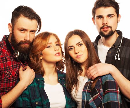 life style, happiness and people concept: attractive group of happy young men and women. Hipster...